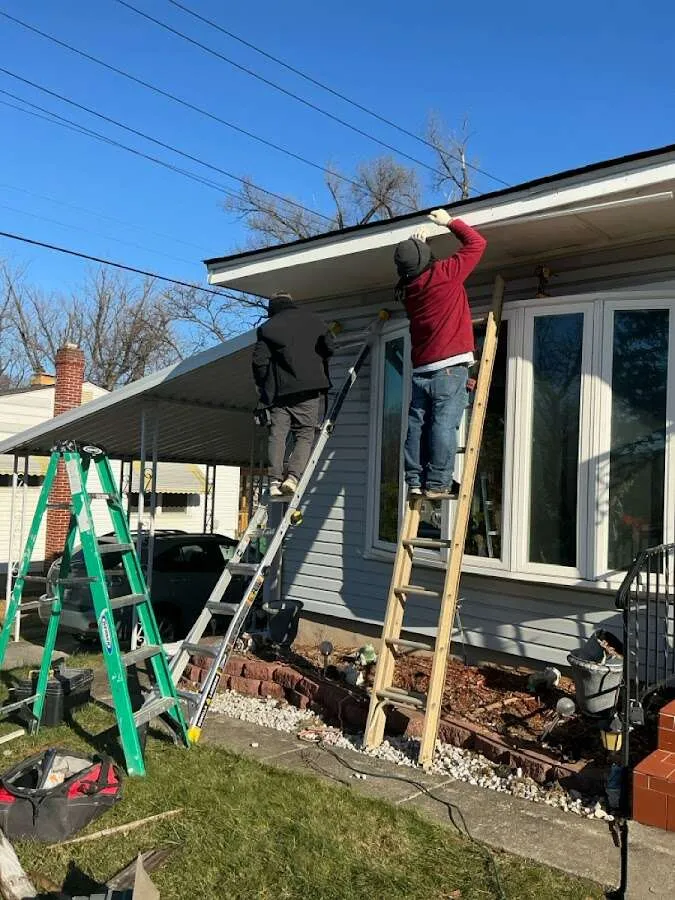 Restoration crew performing exterior repair in Hallsville