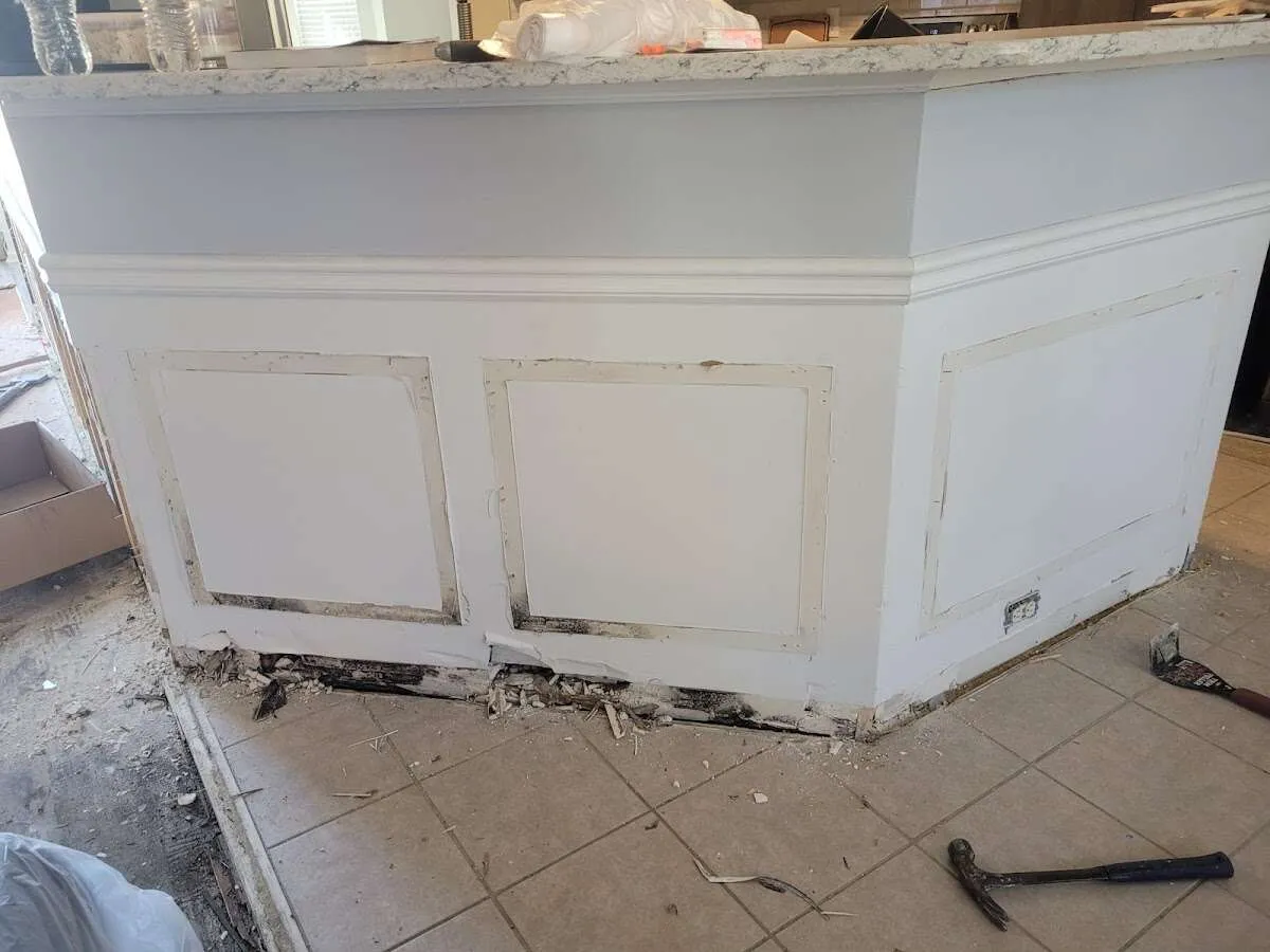 Water damage and mold on kitchen during Storm Damage Restoration in Hallsville